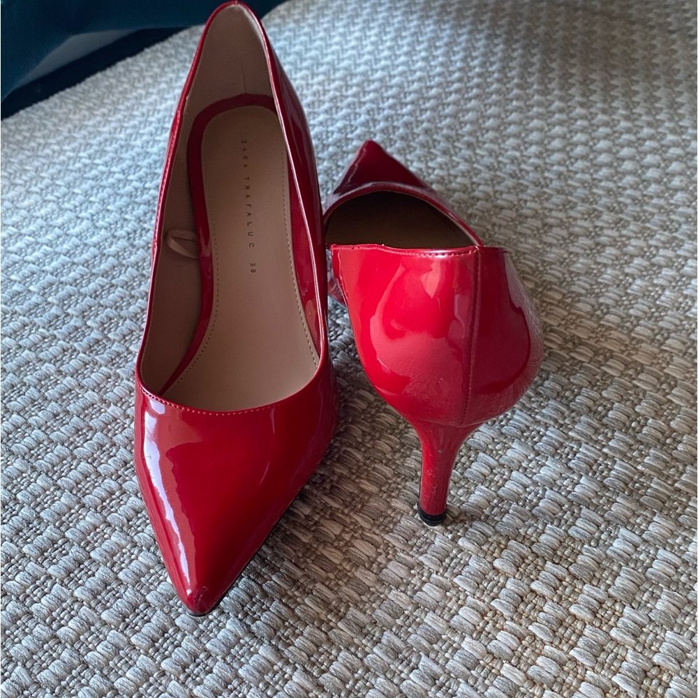 Red pointed toe heels